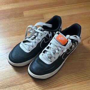 Nike Black and White Sneakers with Orange Detail